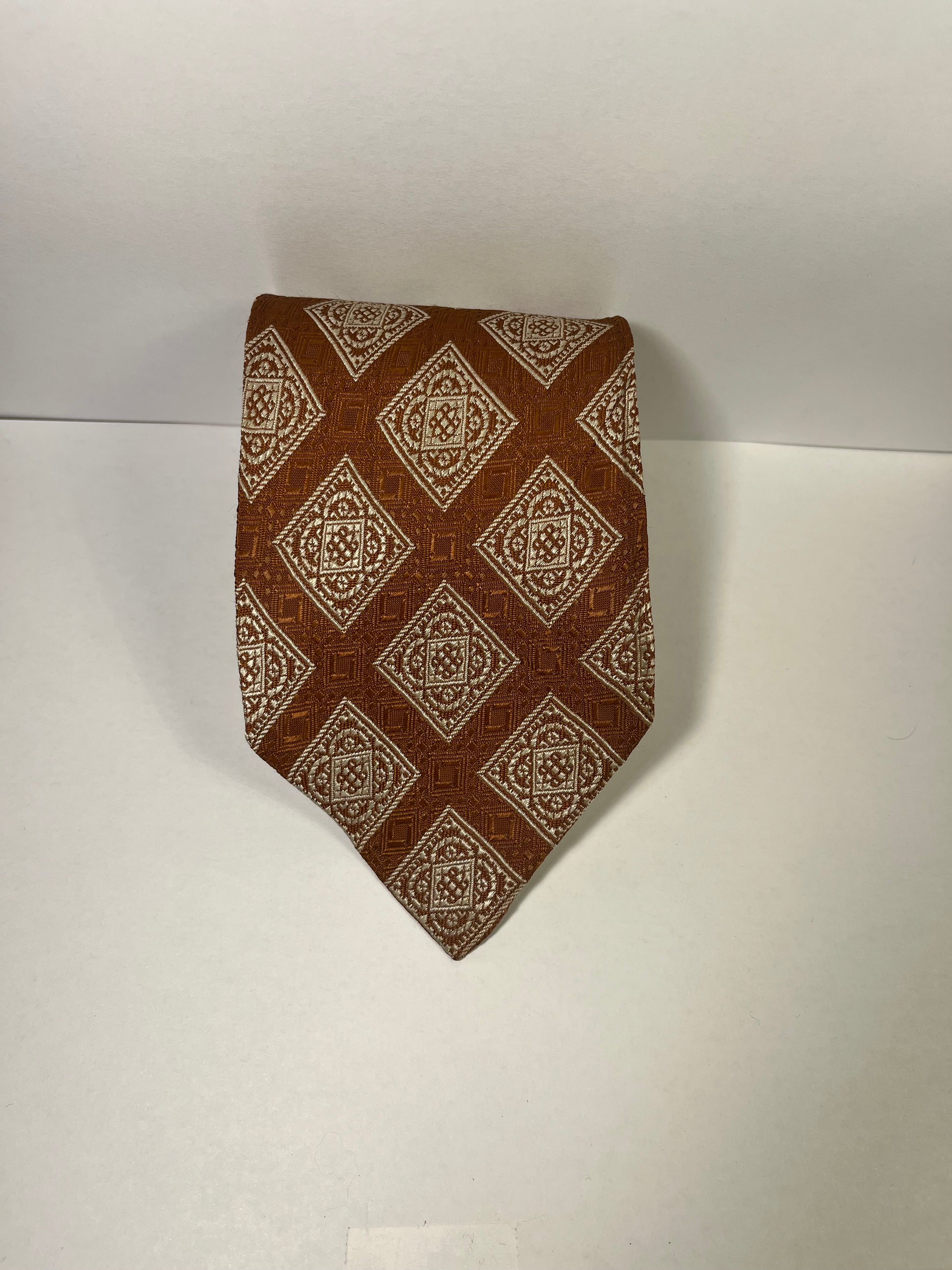 Brown triangular patterned tie