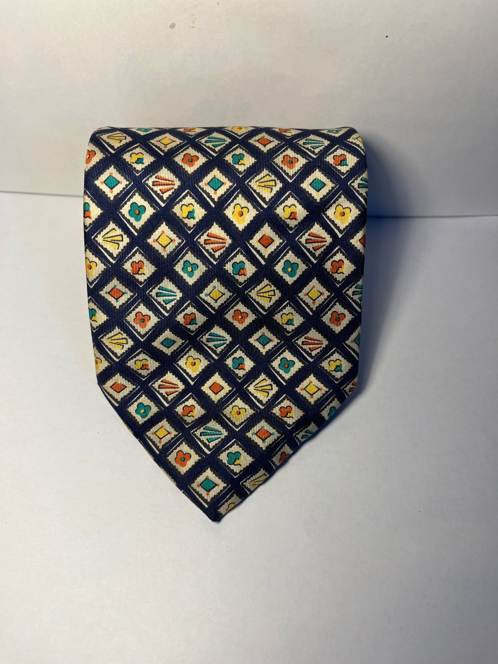 Triangular shaped patterned tie made in Italy 100% silk