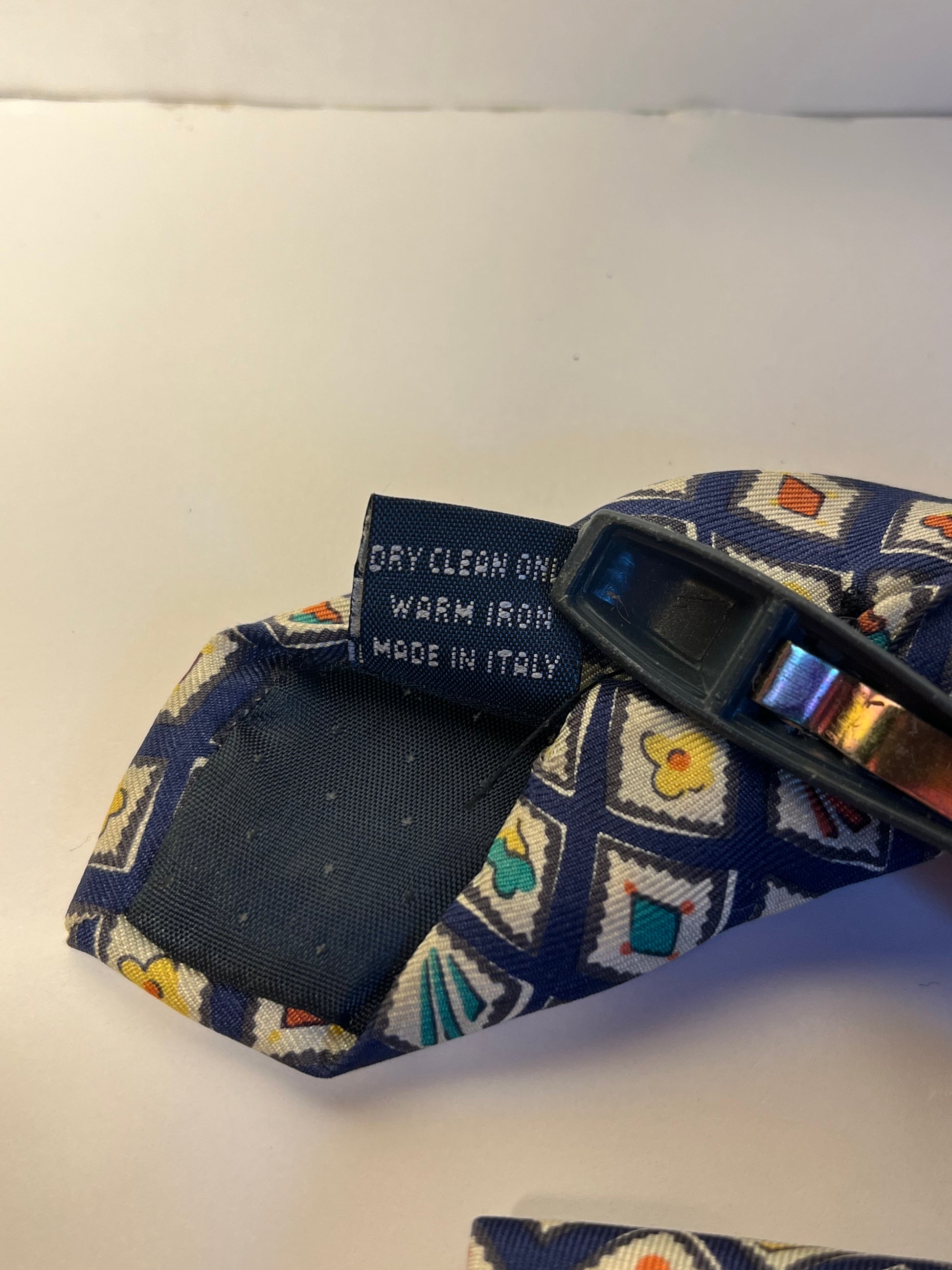 Triangular shaped patterned tie made in Italy 100% silk